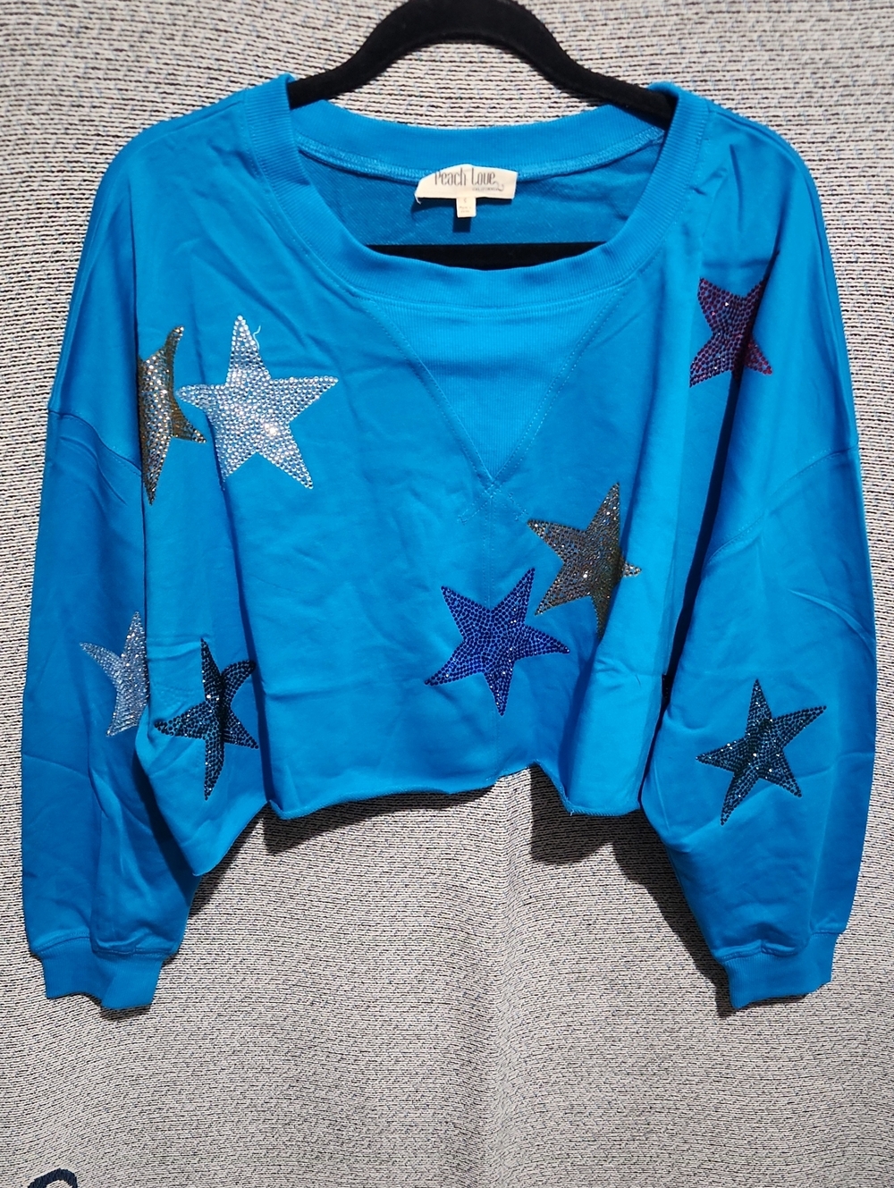 Peach Love California Bright Blue Star Embellished Cropped Crewneck Sweatshirt